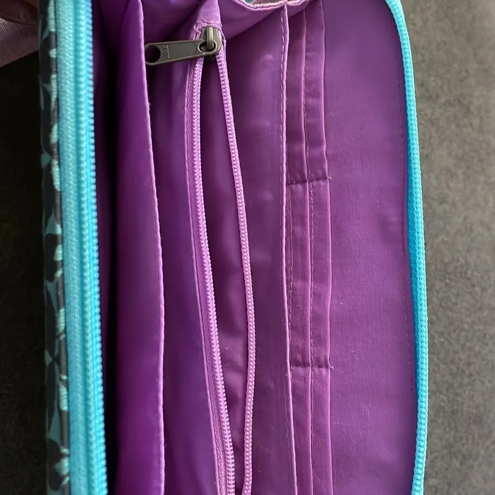 Malia designs zippered wristlet.